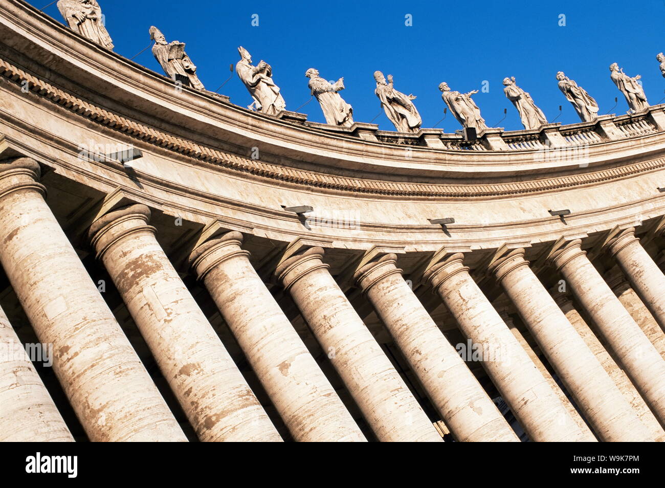 Gian Lorenzo Bernini's 17th century colonnade and statues of saints, Piazza San Pietro, St. Peter's, Vatican City, Rome, Lazio, Italy, Europe Stock Photo