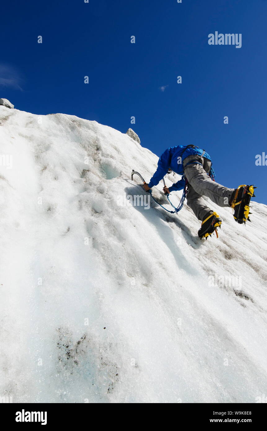 Ice climber at Mer de Glace glacier, Chamonix, Haute-Savoie, French Alps, France, Europe Stock Photo