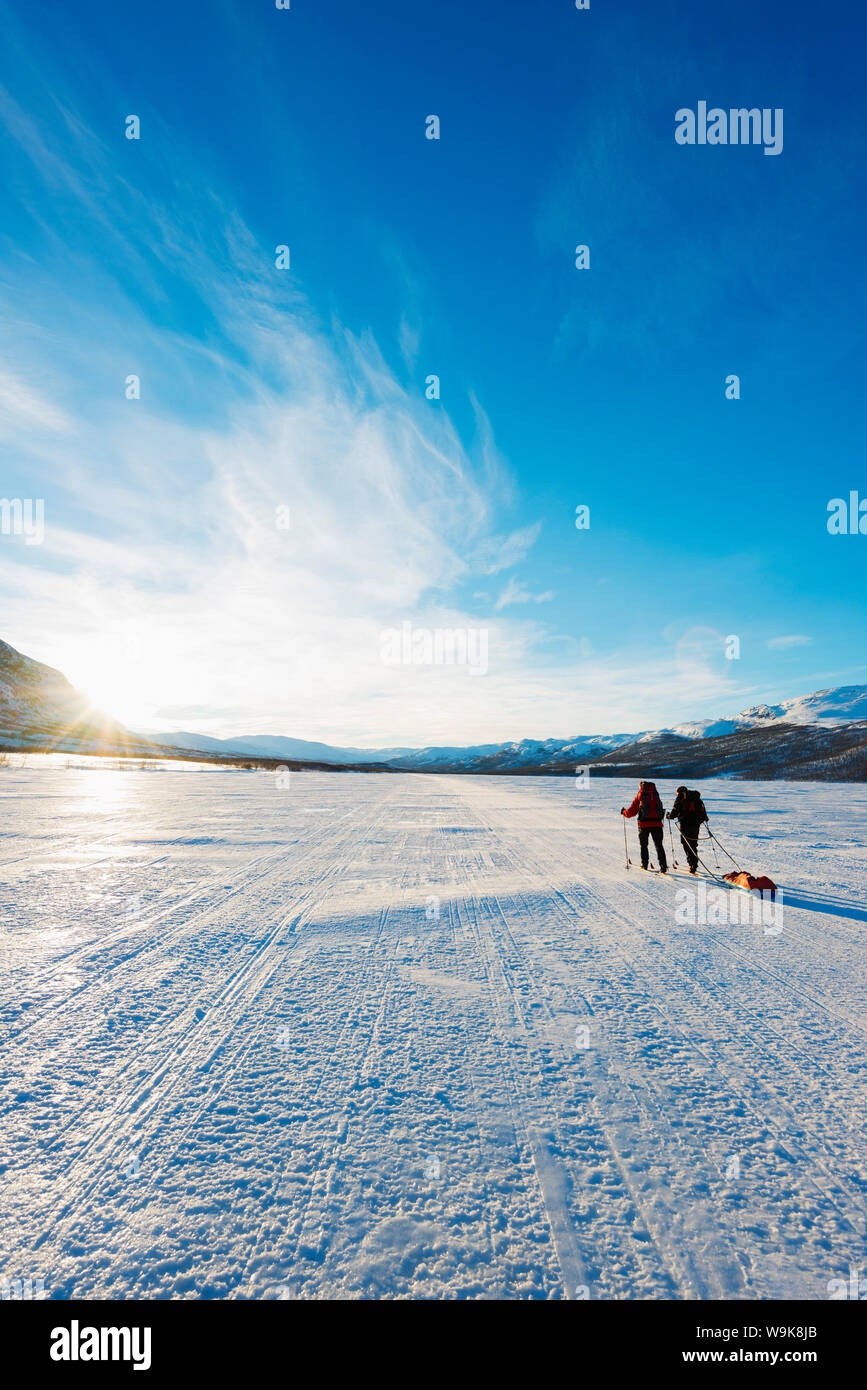 Ski touring on Kungsleden (The Kings Trail) frozen lake, Abisko