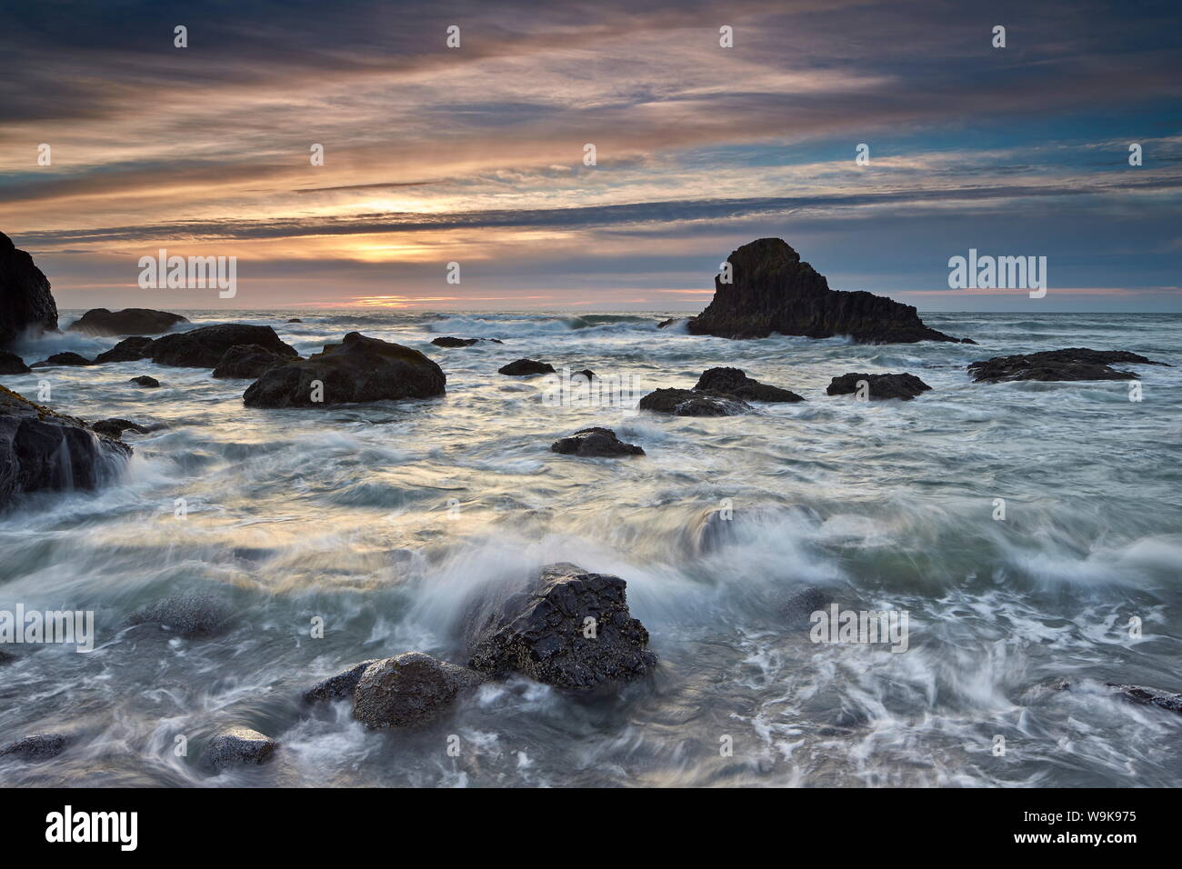 Sunset over sea stacks and surf, Ecola State Park, Oregon, United States of America, North America Stock Photo