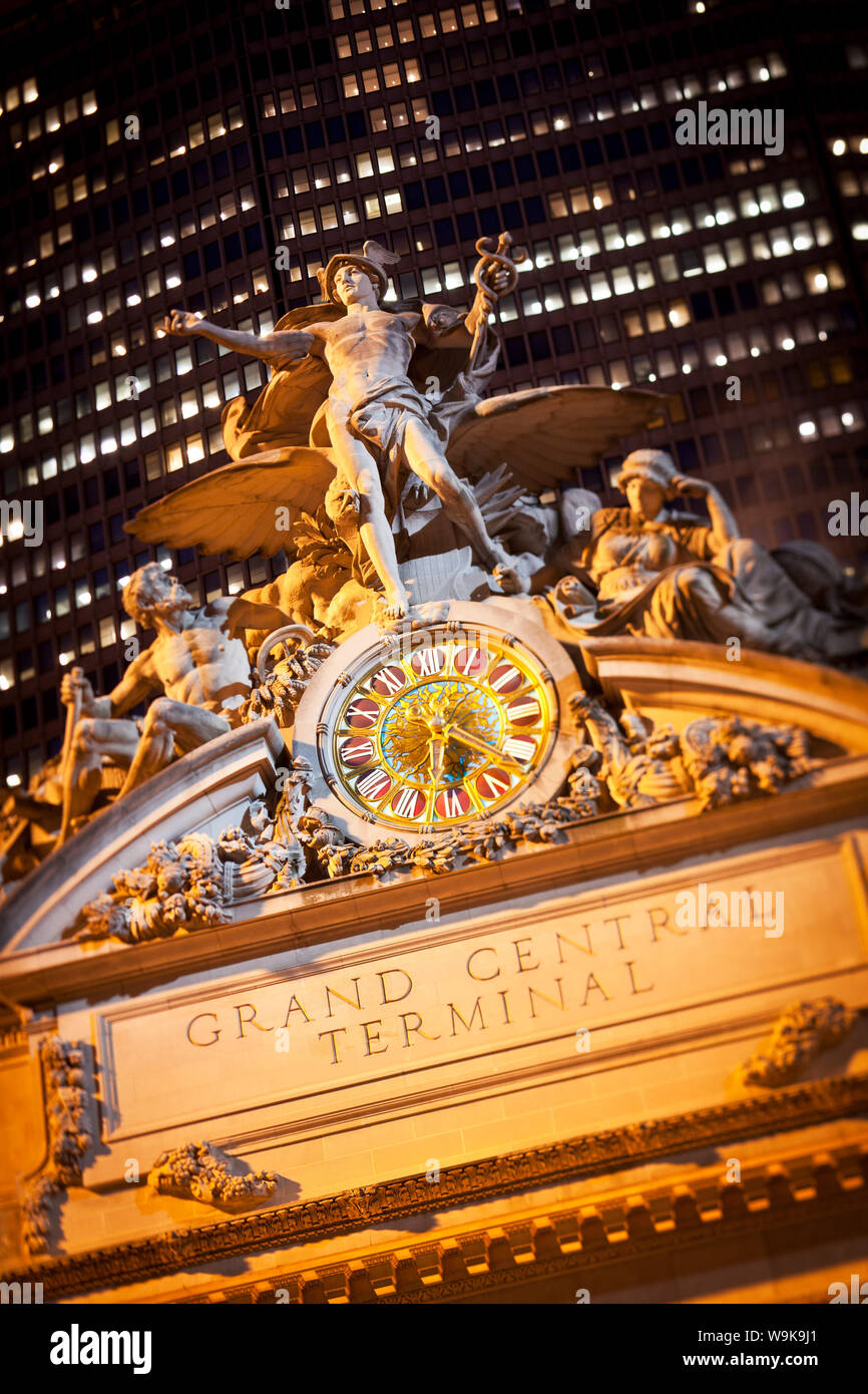 Statue of Mercury and Clock on the 42nd Street facade of Grand Central Terminus Station, Manhattan, New York City, New York, United States of America Stock Photo