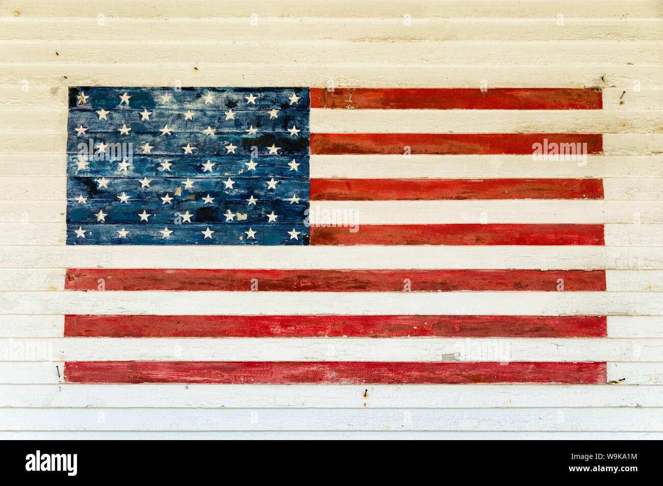 US Flag painted on the side of a wooden building in the historic area of Chatham, Massachusetts, New England, United States of America, North America Stock Photo