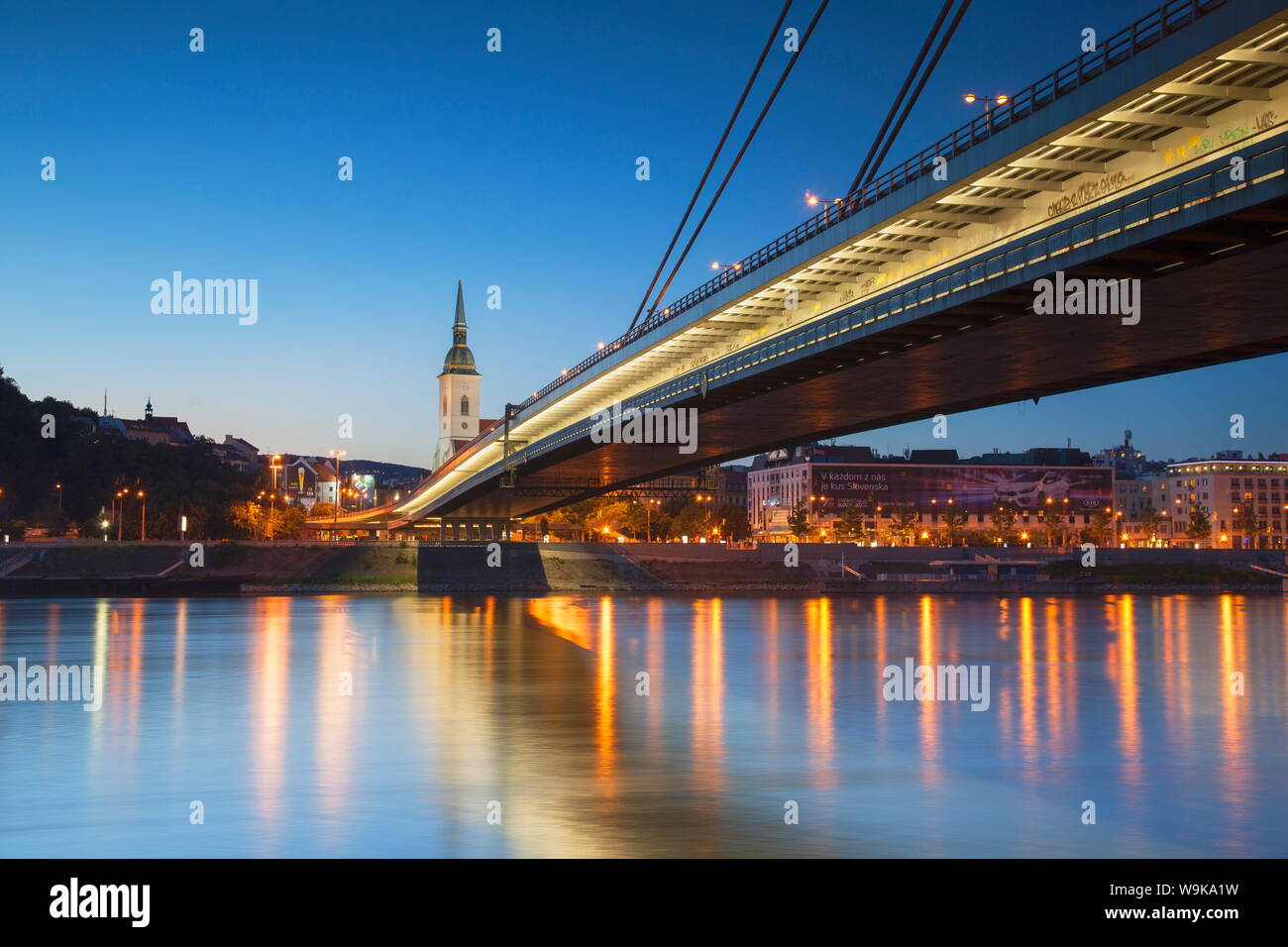 St. Martin's Cathedral and New Bridge over the River Danube at dusk, Bratislava, Slovakia, Europe Stock Photo