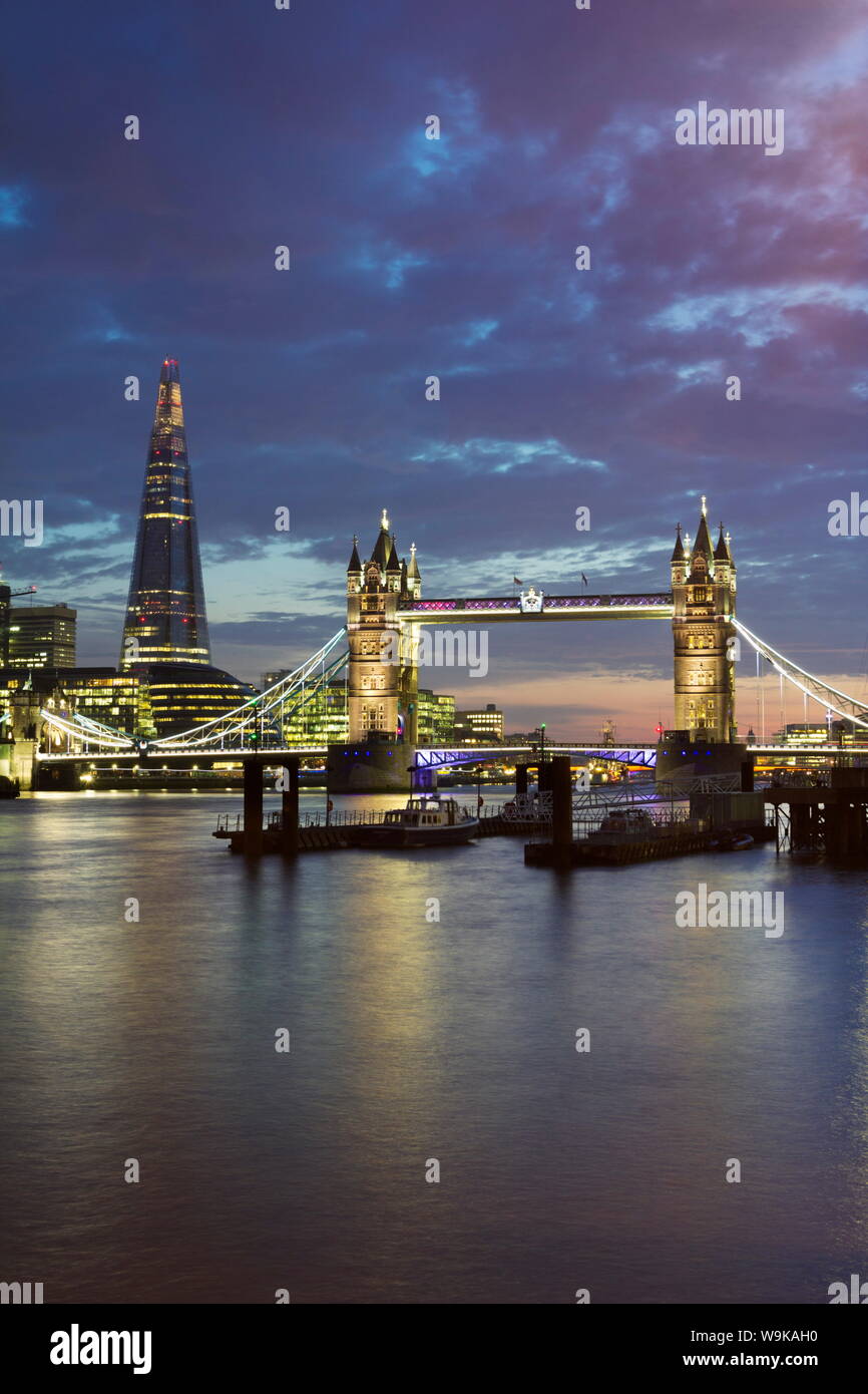 The Shard and Tower Bridge on the River Thames at night, London, England, United Kingdom, Europe Stock Photo
