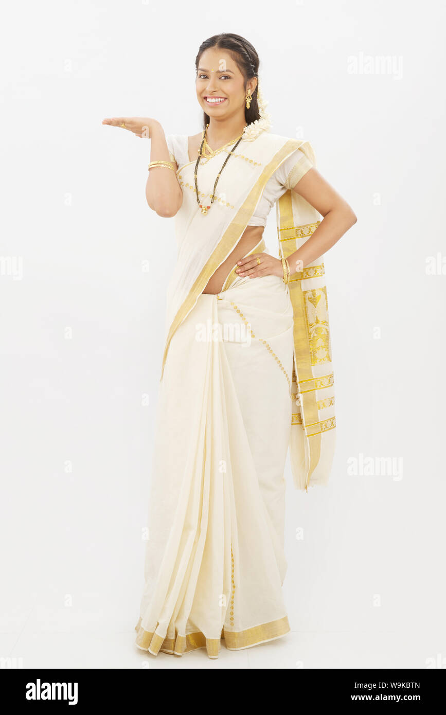 South Indian woman smiling and gesturing Stock Photo - Alamy