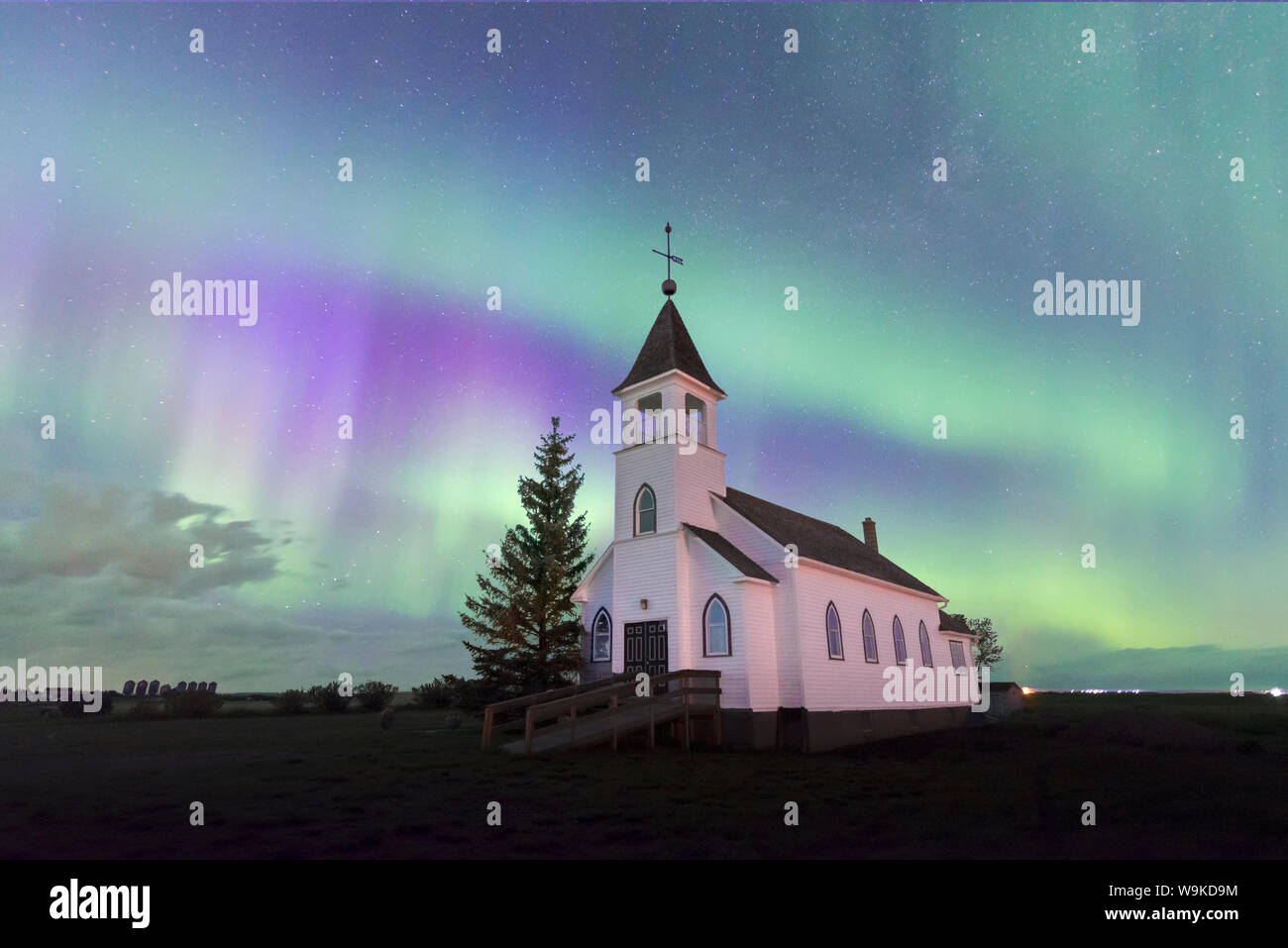 Aurora Borealis over the historic Zion Lutheran Church in Saskatchewan, Canada Stock Photo