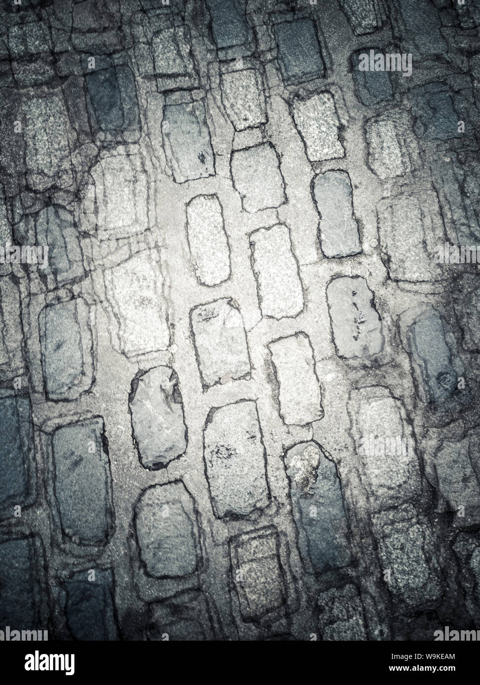 double vision full frame shot of granite cobbled street from above (layered image) Stock Photo