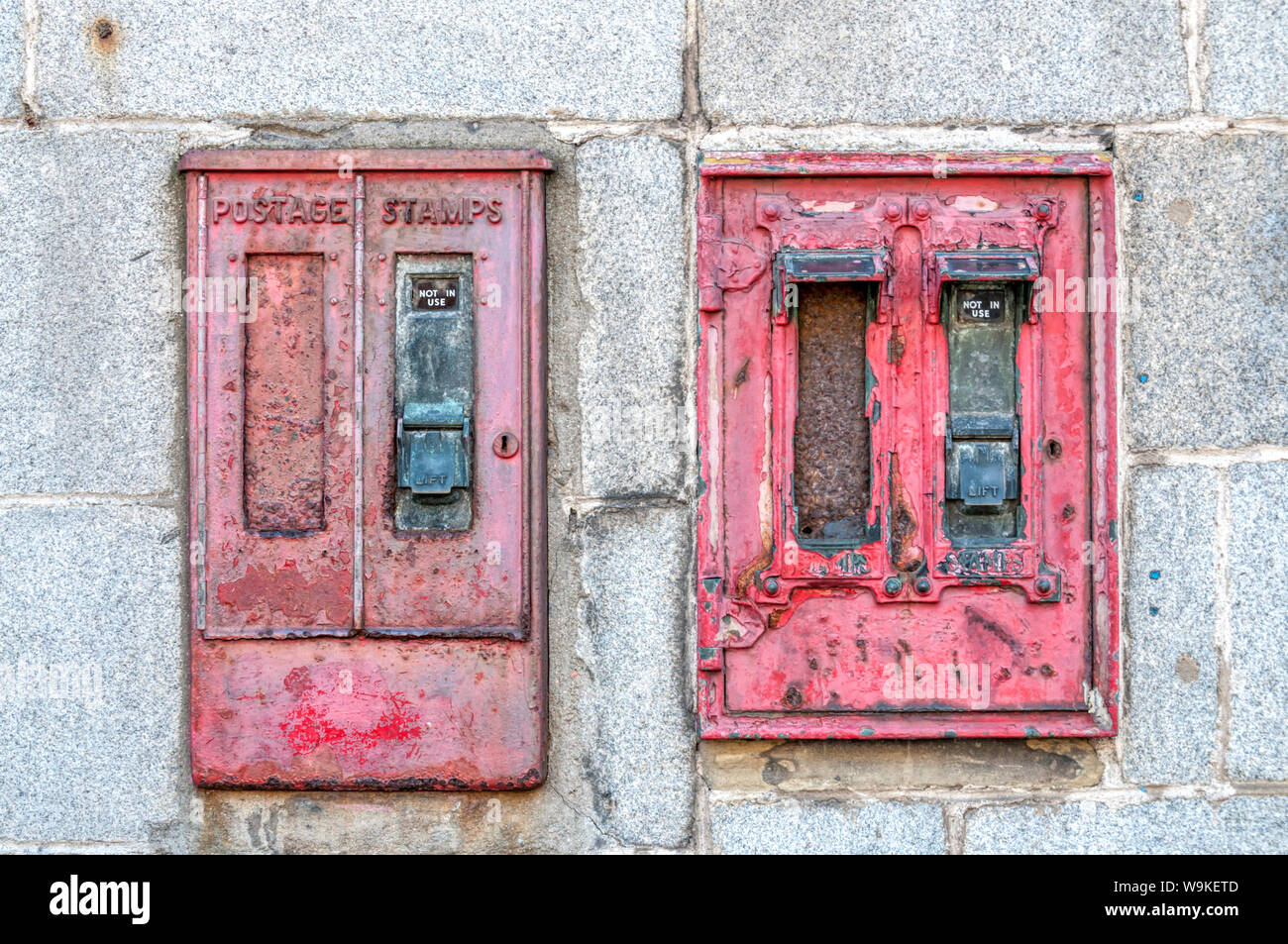 A pair of old unused postage stamp vending machines in Aberdeen. Stock Photo