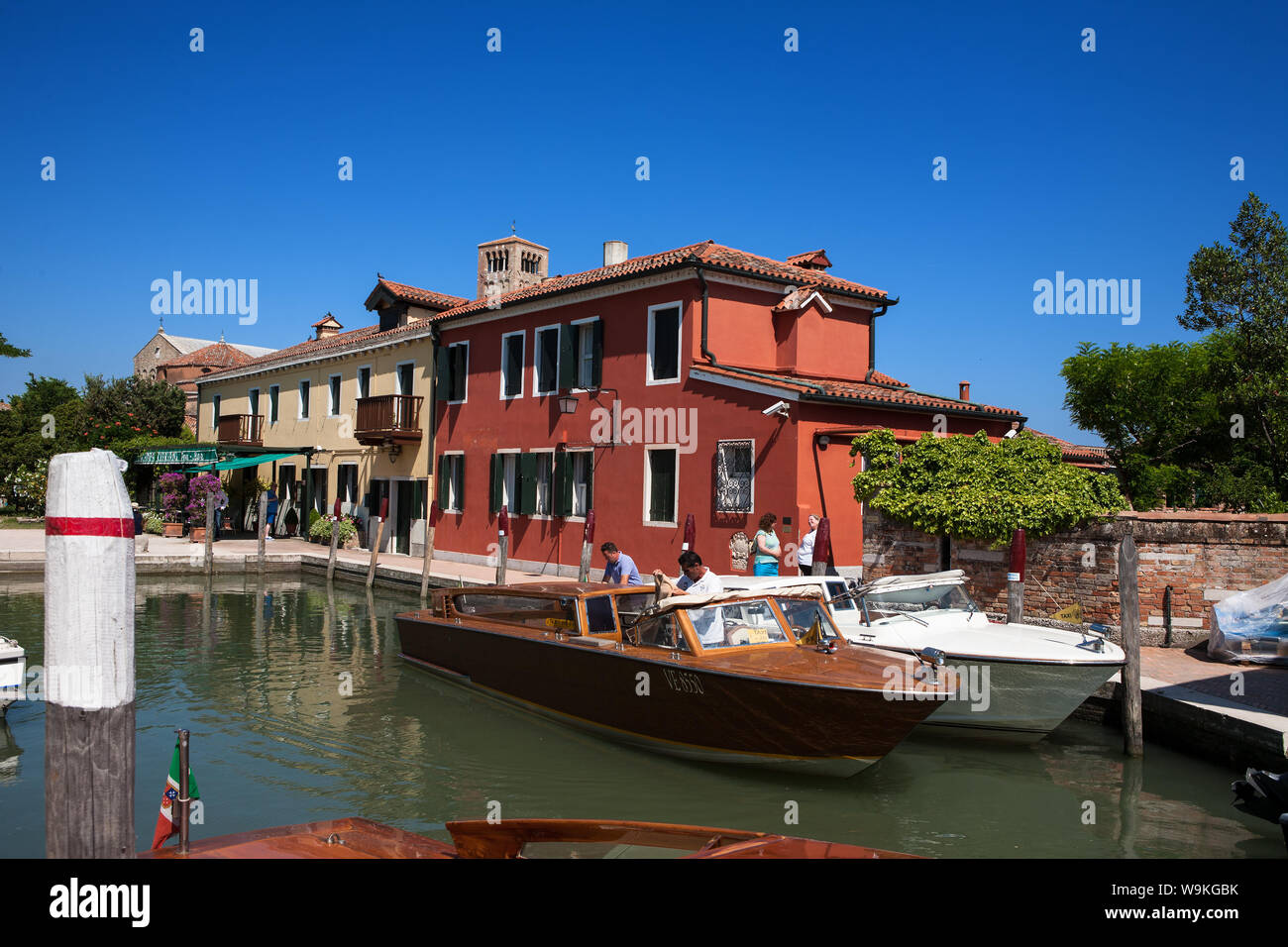 Motoscafi in the canal basin at Piazza Santa Fosca on the island of Torcello, Venetian Lagoon, Veneto, Italy Stock Photo
