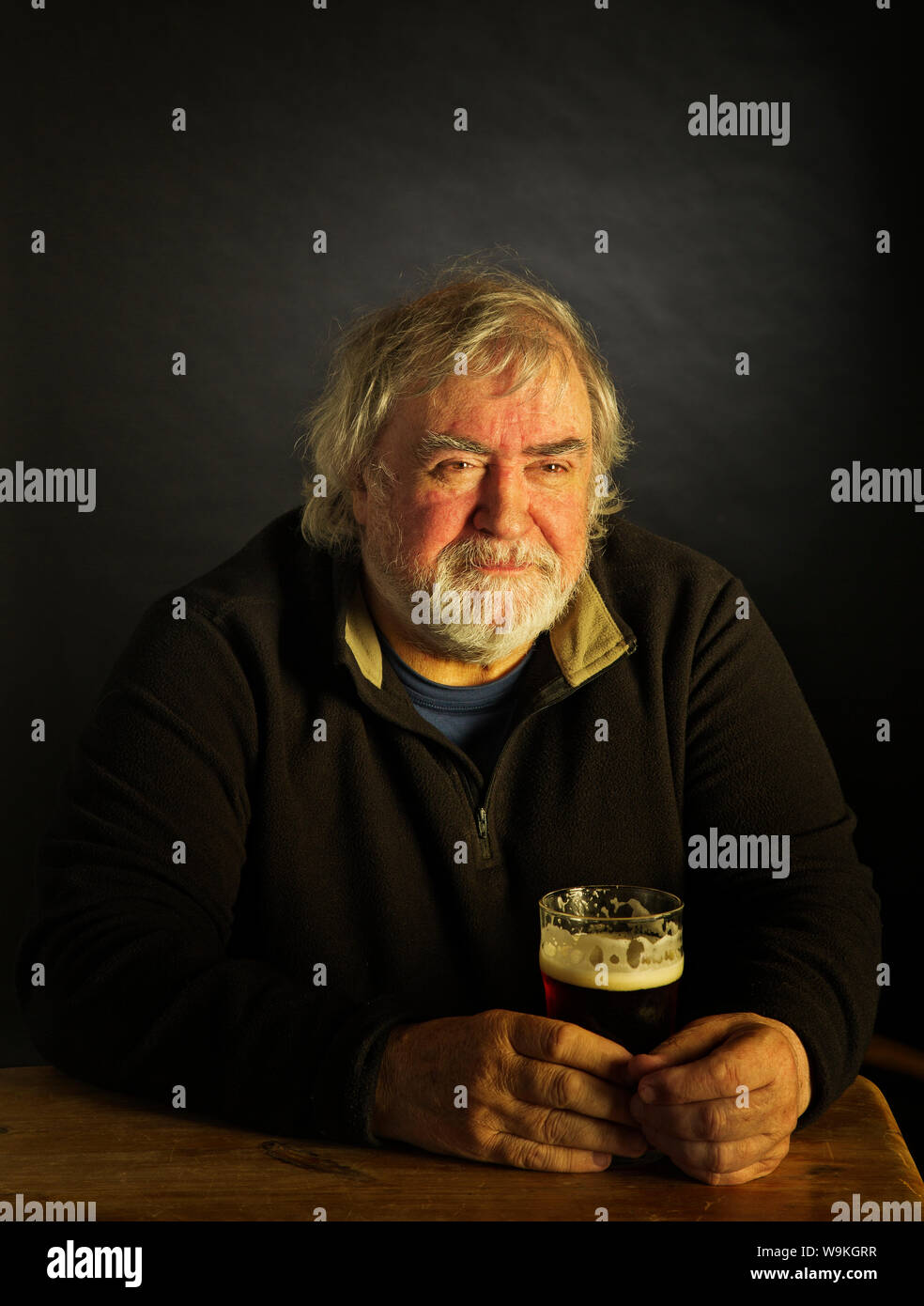 Old man drinking beer hi-res stock photography and images - Alamy