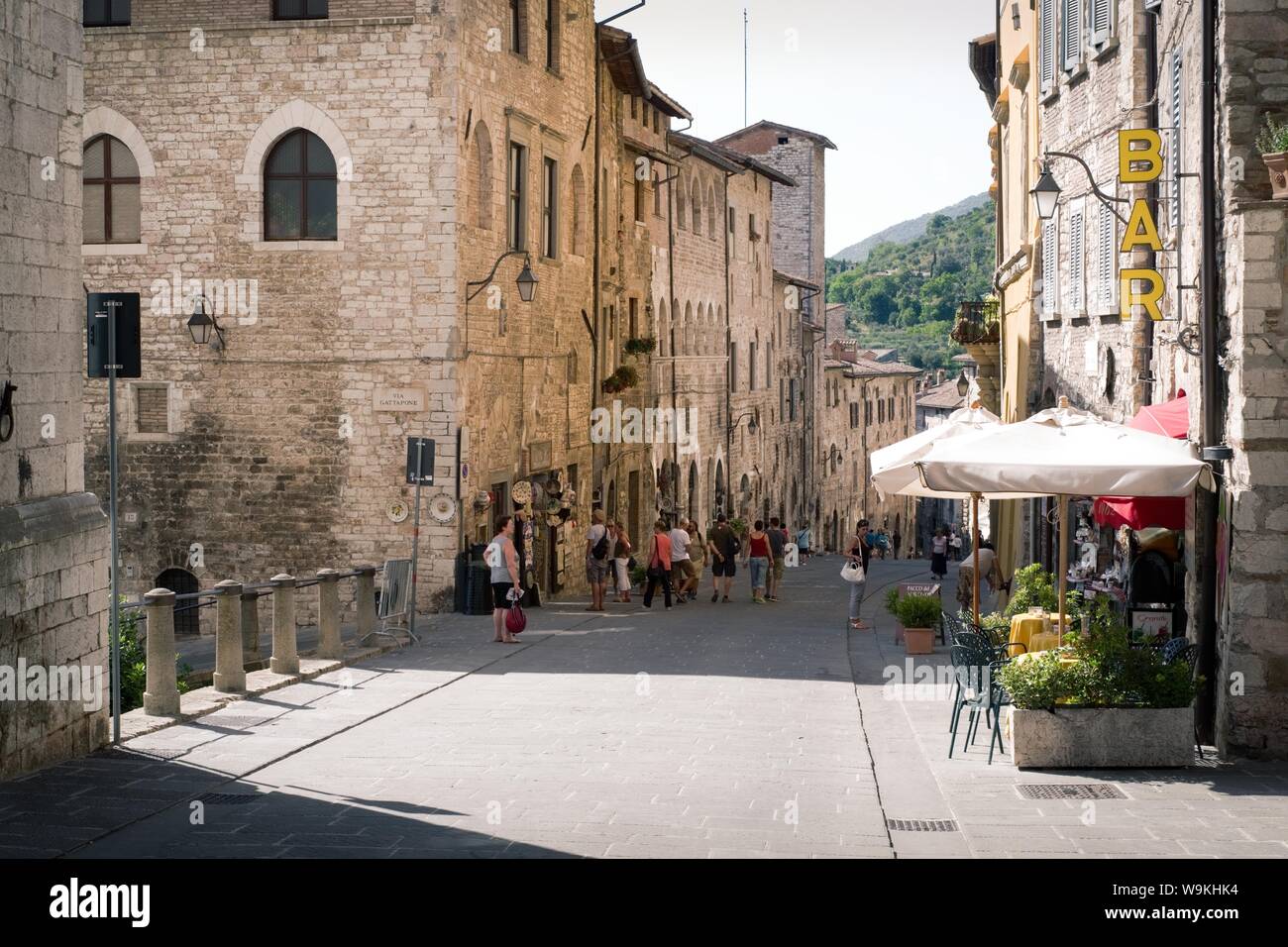 Gubbio, Italy - 11 August, 2019: Tourists visit a street in the Umbrian  city on a hot summer day Stock Photo - Alamy