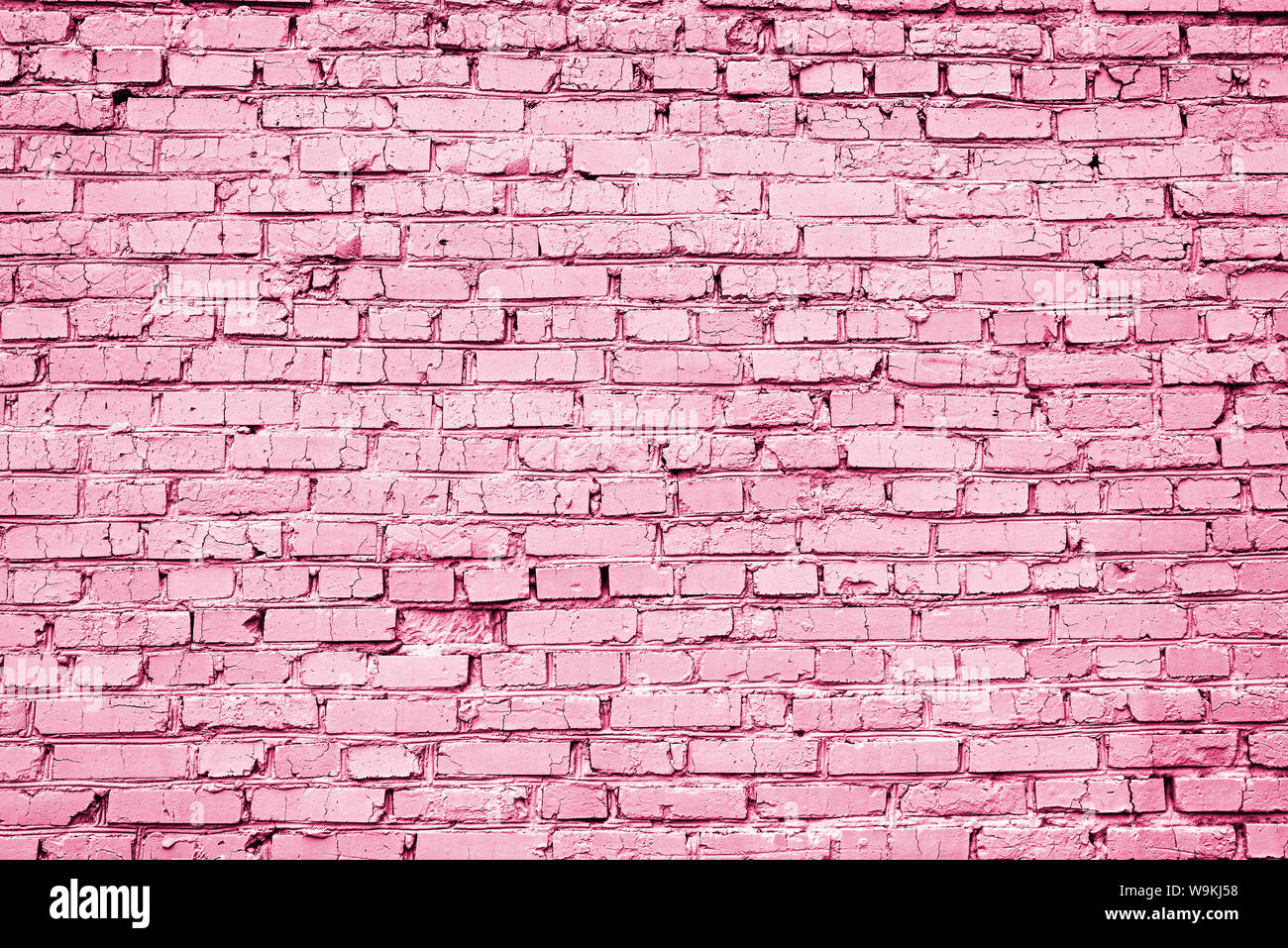 Creative layout of light pink brick wall. texture of the brick masonry