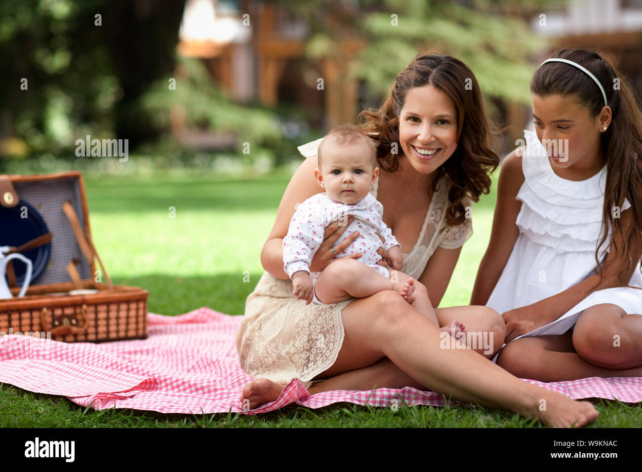 Happy daughters having picnic hi-res stock photography and images - Alamy