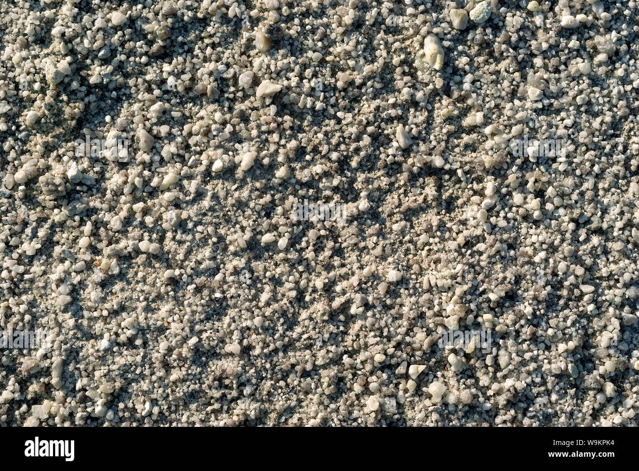 background, texture - fine gravel, or gypsum, or mineral salt Stock Photo