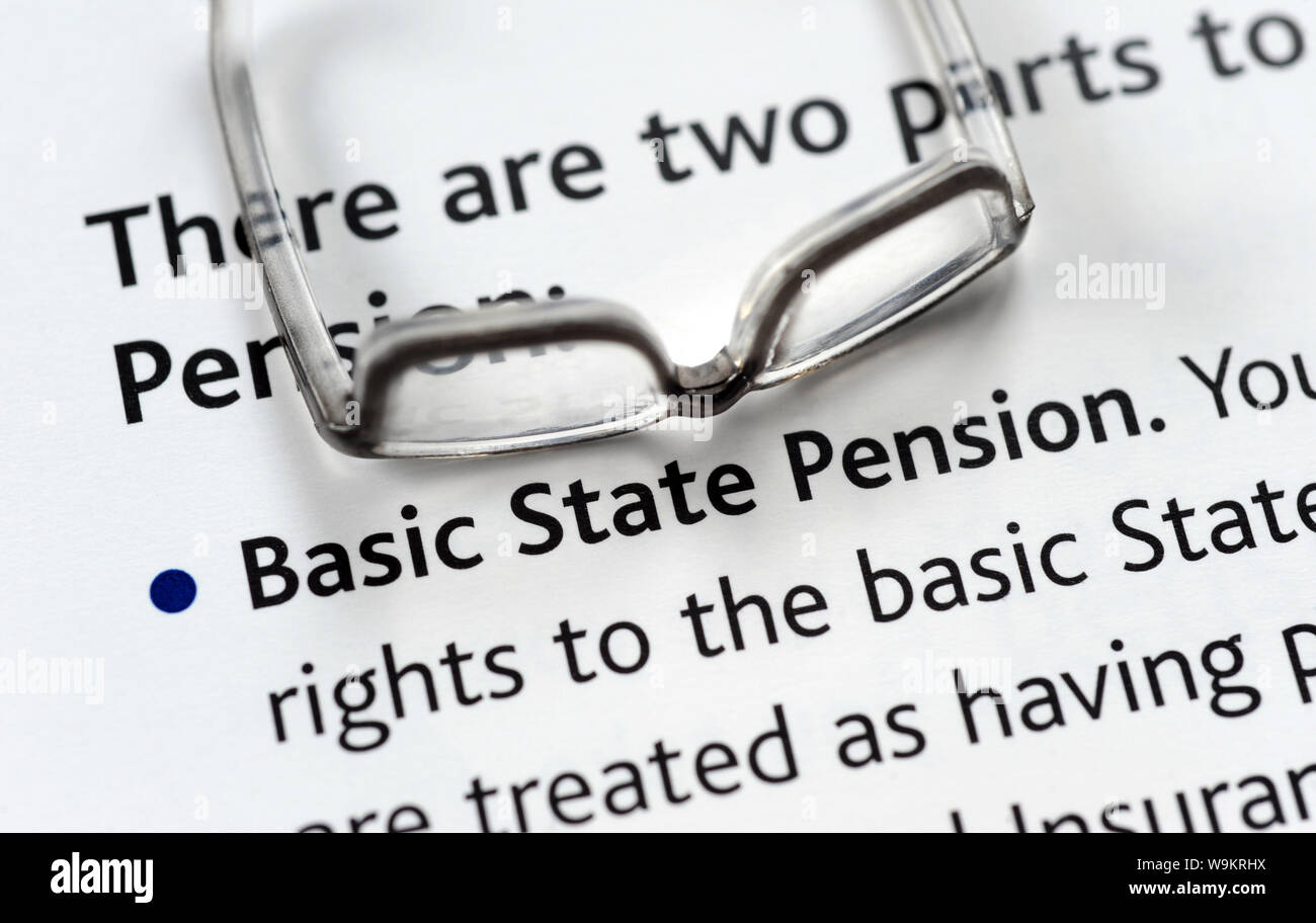 STATE PENSION LITERATURE WITH SPECTACLES RE PENSIONS OLD AGE RETIREMENT PENSIONERS INCOMES ETC UK Stock Photo