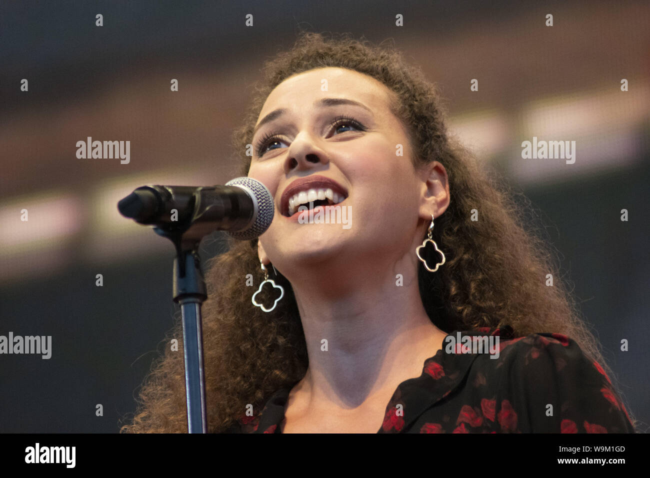 Chicago, IL, USA. 12th Aug, 2019. Despite reports of serious storms, a massive crowd gathered in Millennium Park, Chicago to see the free Broadway in Chicago concert on August 12, 2019. The lead singers from 13 musicals wowed the audience with their performances. ABC-TV reporter Janet Davies and Teatro Zinzanni's Frank Ferrante were the MCs for this event. The show previewed some of the shows coming to Chicago including Frozen, Jesus Christ Superstar, Mean Girls and the Donna Summer Musical. Pictured: Shereen Ahmed from My Fair Lady. Credit: Karen I. Hirsch/ZUMA Wire/Alamy Live News Stock Photo