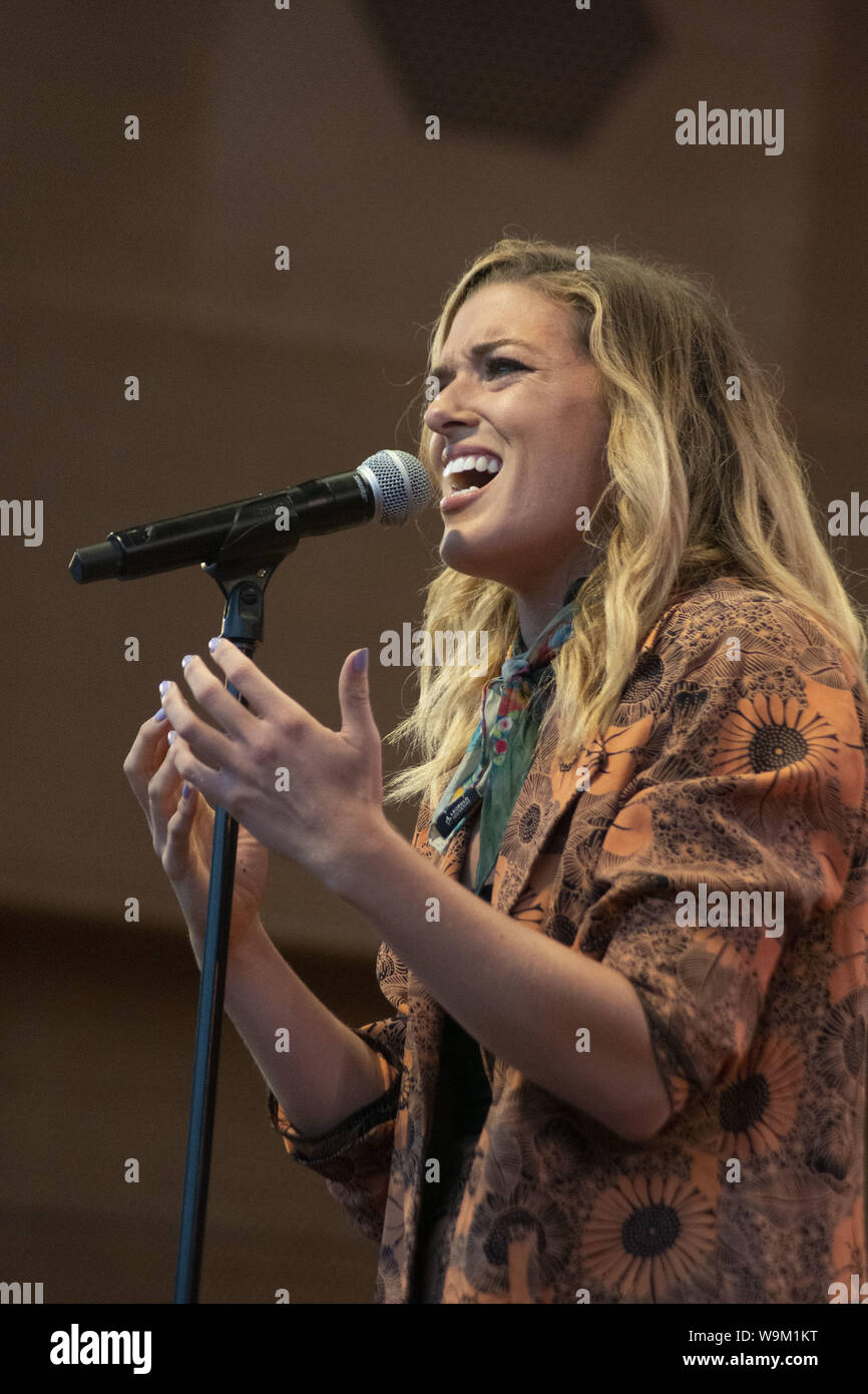 Chicago, IL, USA. 12th Aug, 2019. Despite reports of serious storms, a massive crowd gathered in Millennium Park, Chicago to see the free Broadway in Chicago concert on August 12, 2019. The lead singers from 13 musicals wowed the audience with their performances. ABC-TV reporter Janet Davies and Teatro Zinzanni's Frank Ferrante were the MCs for this event. The show previewed some of the shows coming to Chicago including Frozen, Jesus Christ Superstar, Mean Girls and the Donna Summer Musical. Pictured: Mary Kate Morrissey from Mean Girls. Credit: Karen I. Hirsch/ZUMA Wire/Alamy Live News Stock Photo