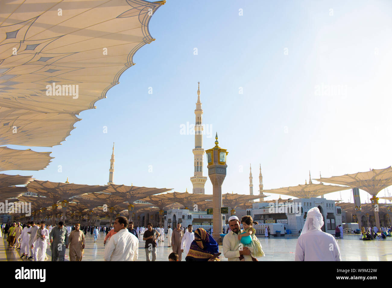 MADINAH, SAUDI ARABIA - AUGUST 2019 : Muslim pilgrims visiting the beautiful Nabawi Mosque destination, the Prophet mosque which has great architectur Stock Photo