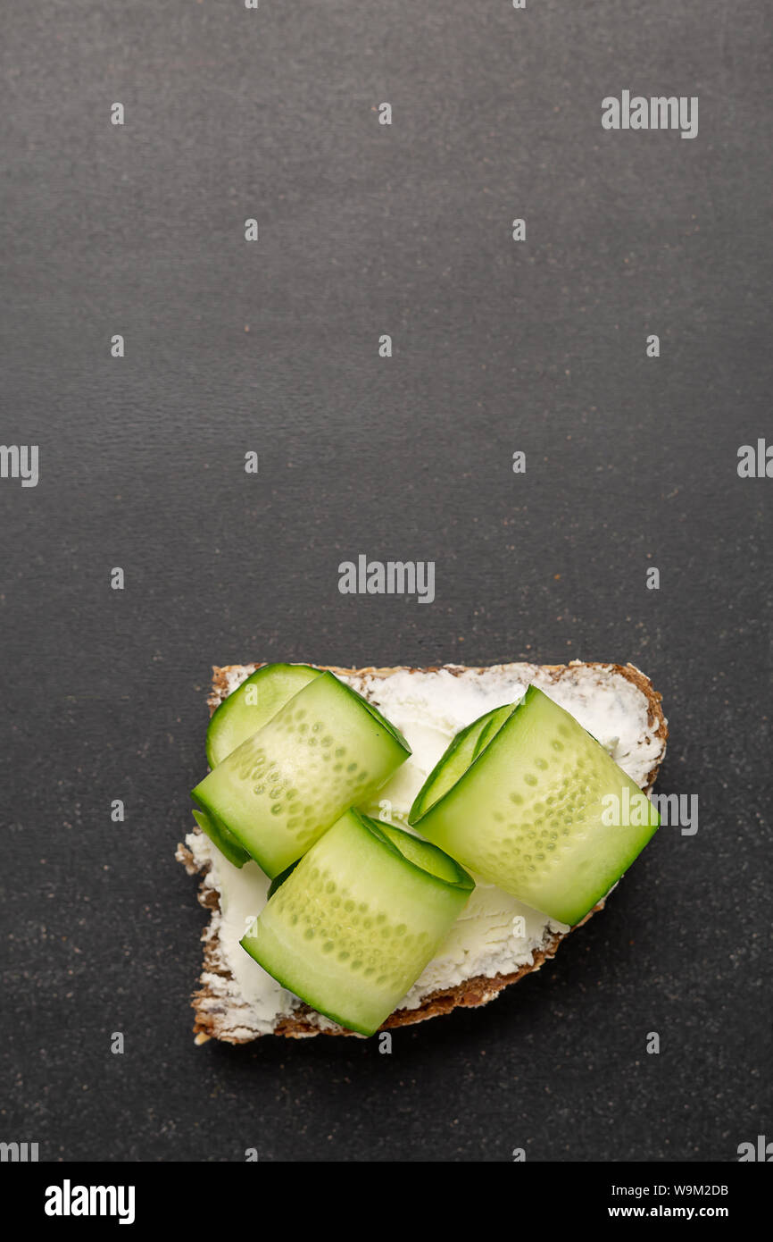 Open sandwich with feta cheese, tomatoes, cucumber Stock Photo