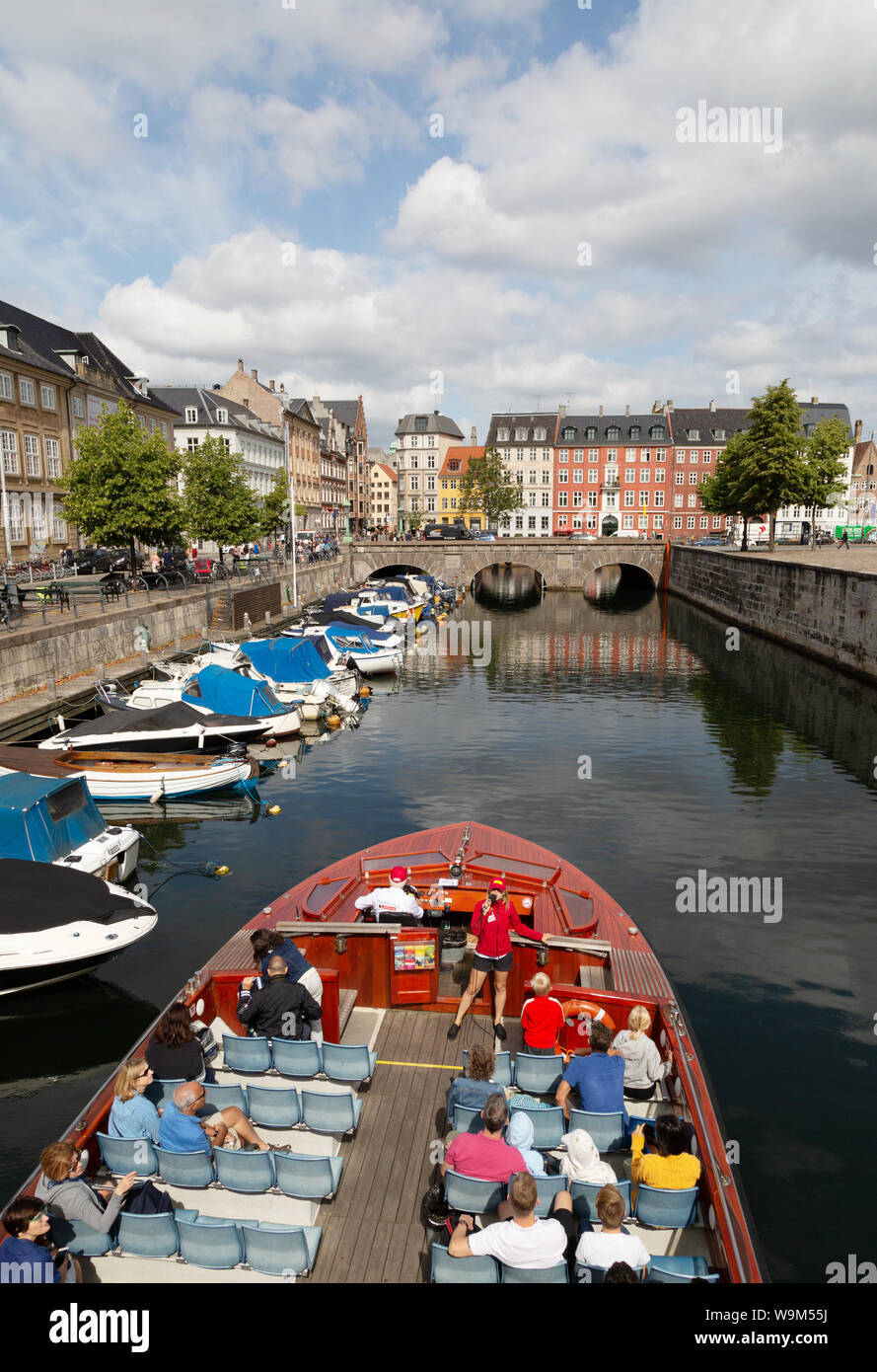 Copenhagen tourism; tourists on a canal boat tour, Copenhagen, Denmark, Scandinavia Europe Stock Photo
