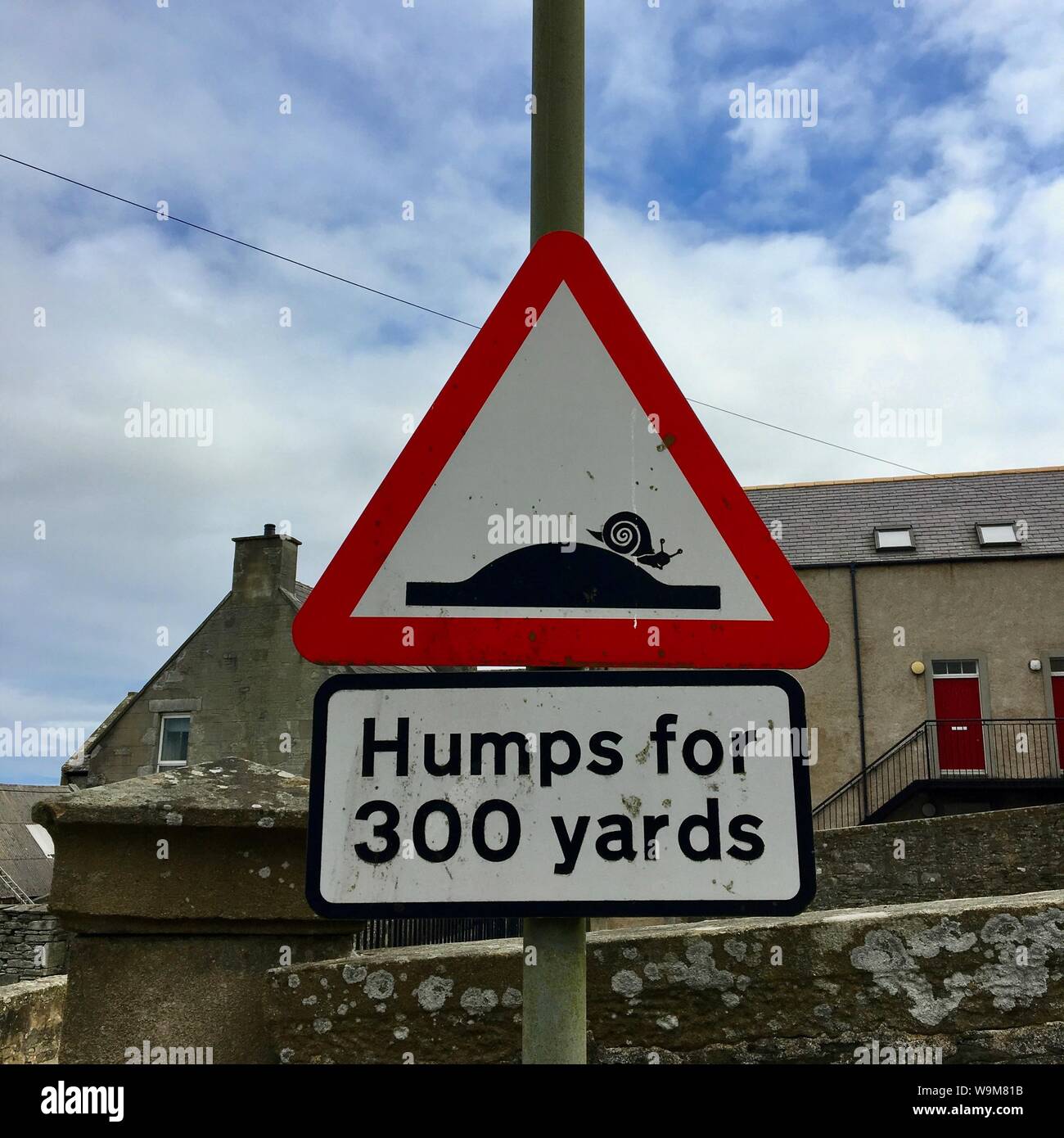 Lerwick road sign with snail crossing hump, Shetland Stock Photo Alamy