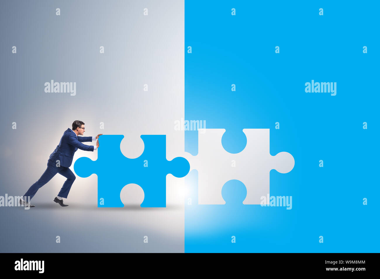 The concept of businessman with missing jigsaw puzzle piece Stock Photo ...