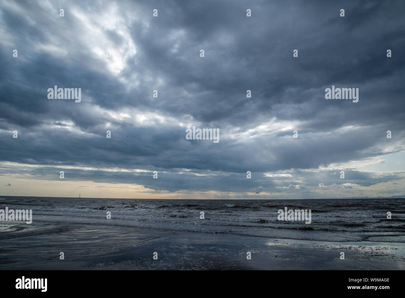 Stormy clouds over Maryport beach Stock Photo