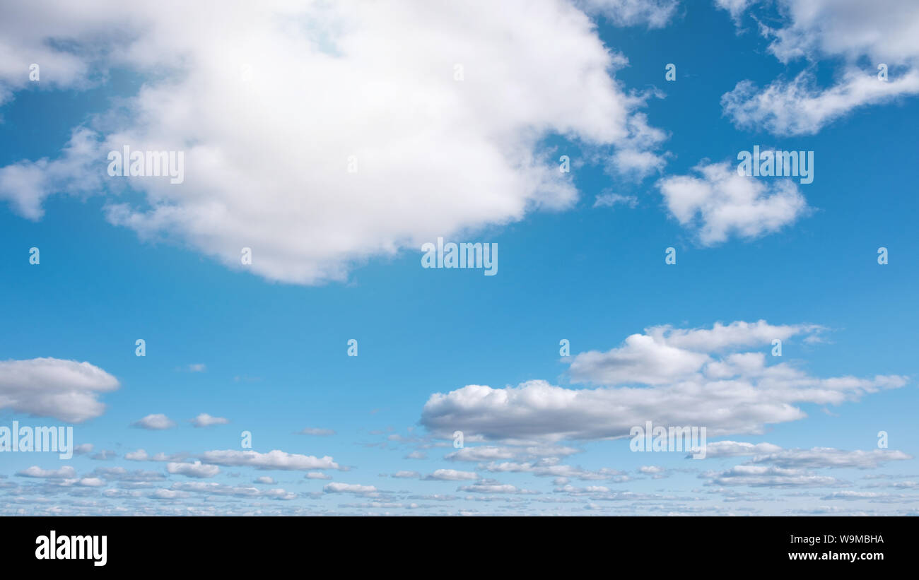 blue sky background with tiny clouds. panorama Stock Photo - Alamy