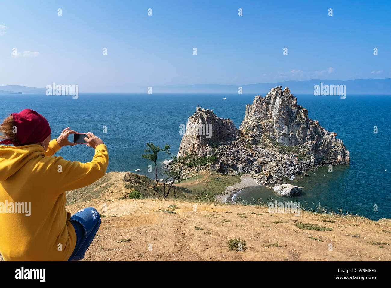 Girl Sitting On High Hill High Resolution Stock Photography and Images ...