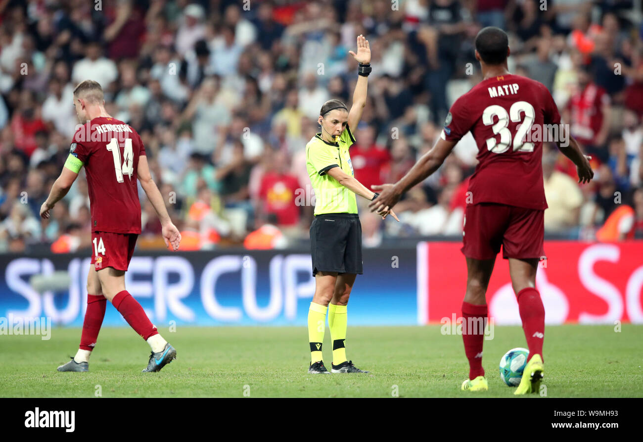 Liverpool's Joel Matip (right) appeals to match referee Stephanie Frappert during the UEFA Super Cup Final at Besiktas Park, Istanbul. Stock Photo