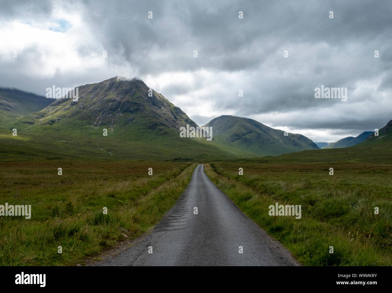 The single track road that passes through Glen Etive. The Highland glen was used as a film location in the Bond film Skyfall. Stock Photo
