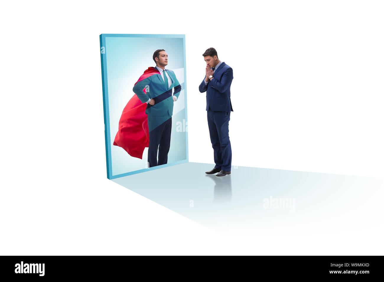 The businessman seeing himself in mirror as superhero Stock Photo - Alamy
