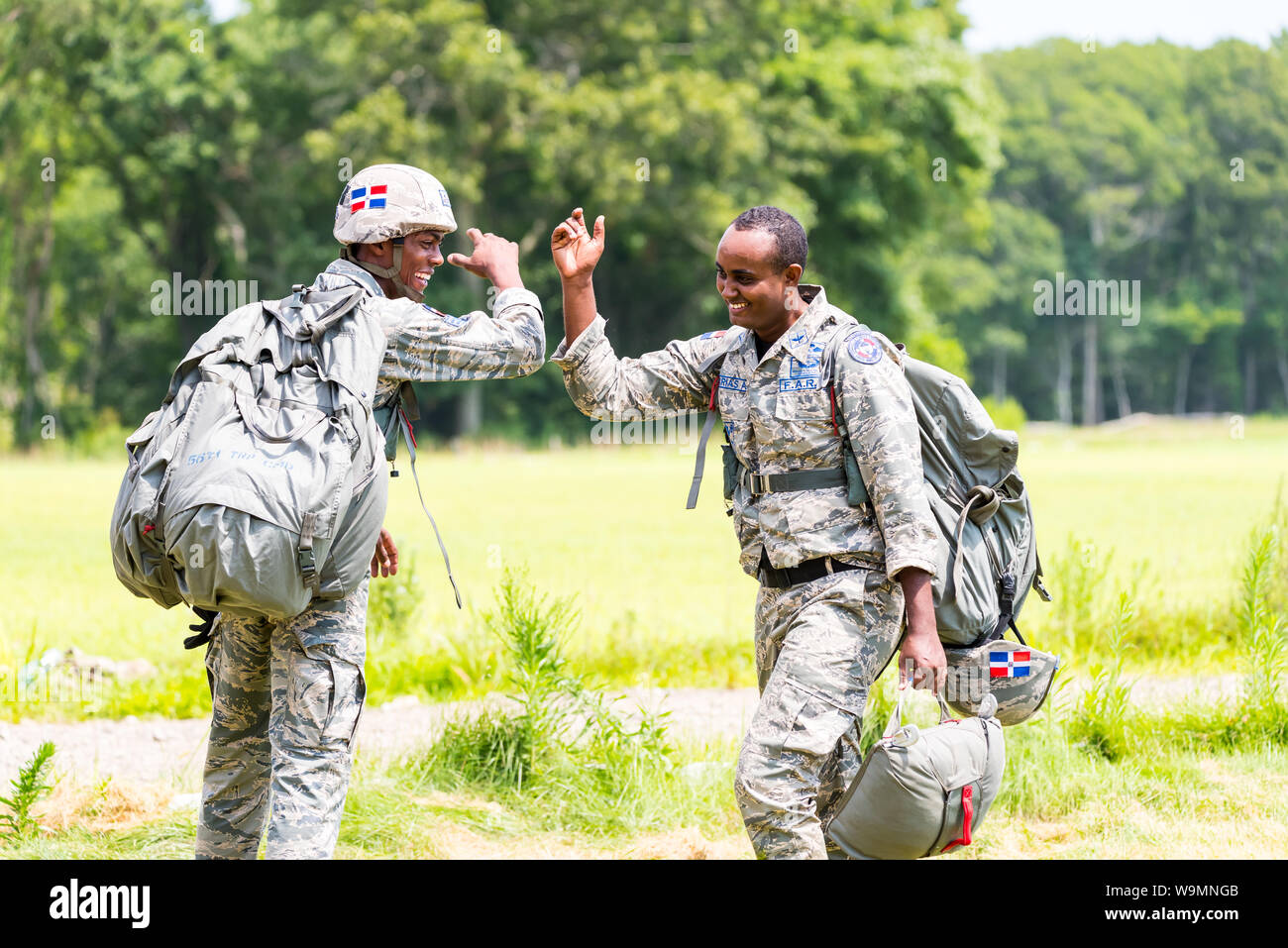 Soldiers congratulating each other at 2019 Leapfest, international static line parachute training event and competition, hosted by RI Natl. Guard. Stock Photo