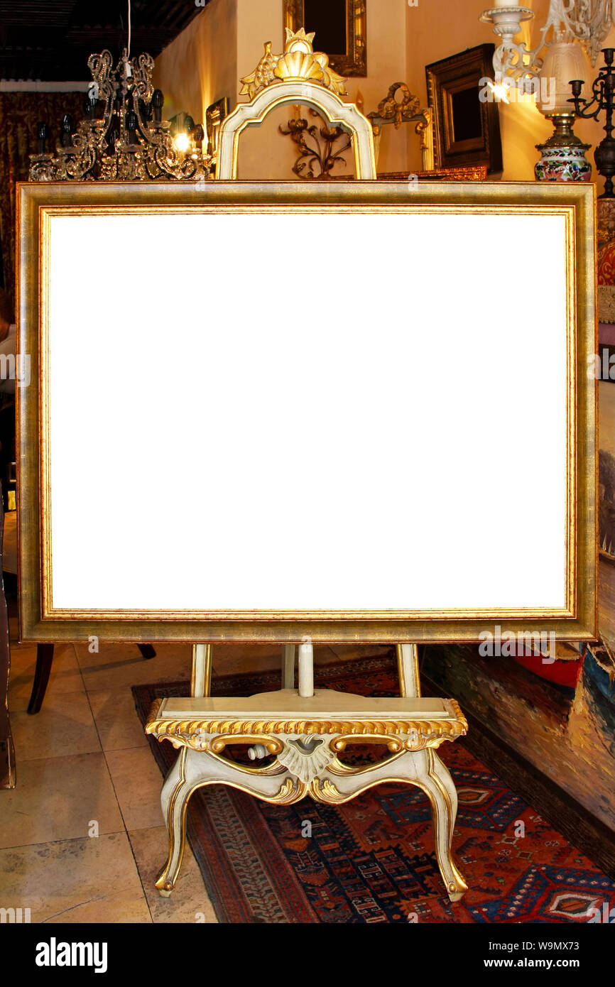 Floor easel with empty frame isolated included clipping path Stock Photo