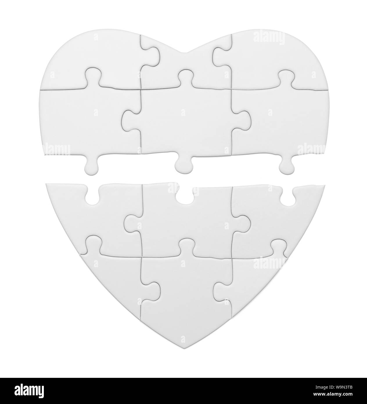 Broken Heart Puzzle Isolated on White Background. Stock Photo