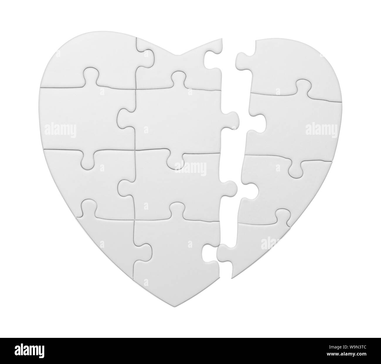 Heart Puzzle Broken with Copy Space Isolated on White. Stock Photo