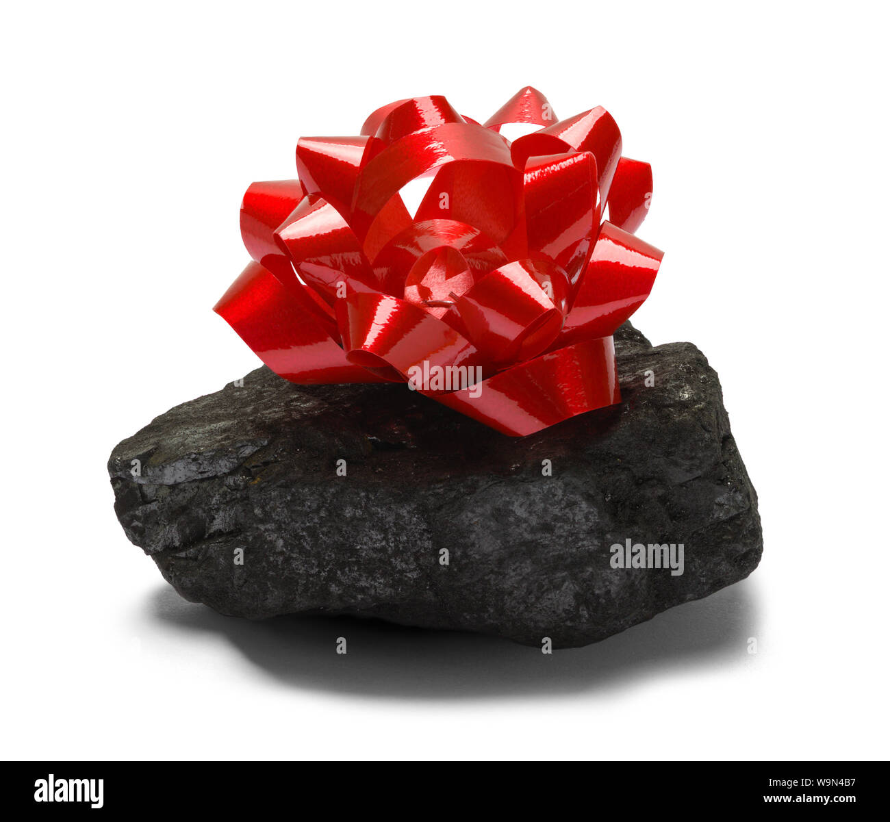 Coal with Red Bow Isolated on White Background. Stock Photo