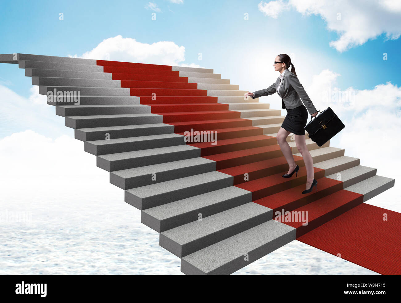 The young businesswoman climbing stairs and red carpet Stock Photo Alamy