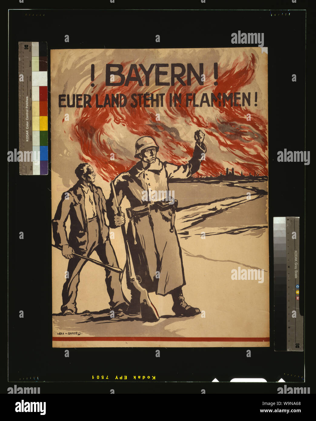Bayern! Euerer Land steht in Flammen! Abstract: Poster shows a civilian man and a soldier watching Munich burn. Text: Bavarians! Your land is burning! Reference is probably to Communist attempts to take over the Bavarian government immediately after the war. Stock Photo