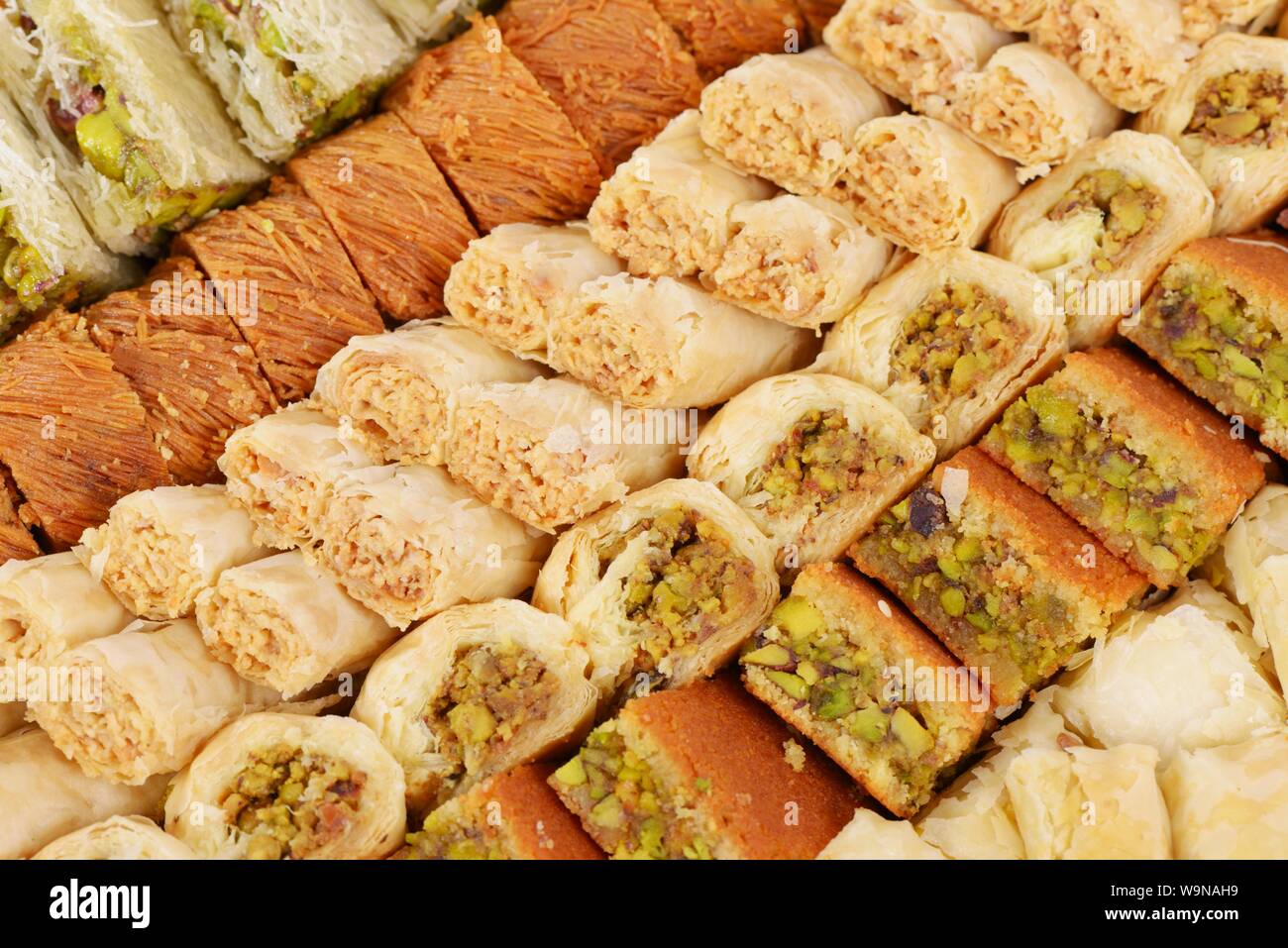 Arabic sweets with pistachios, walnuts and cashew Stock Photo Alamy