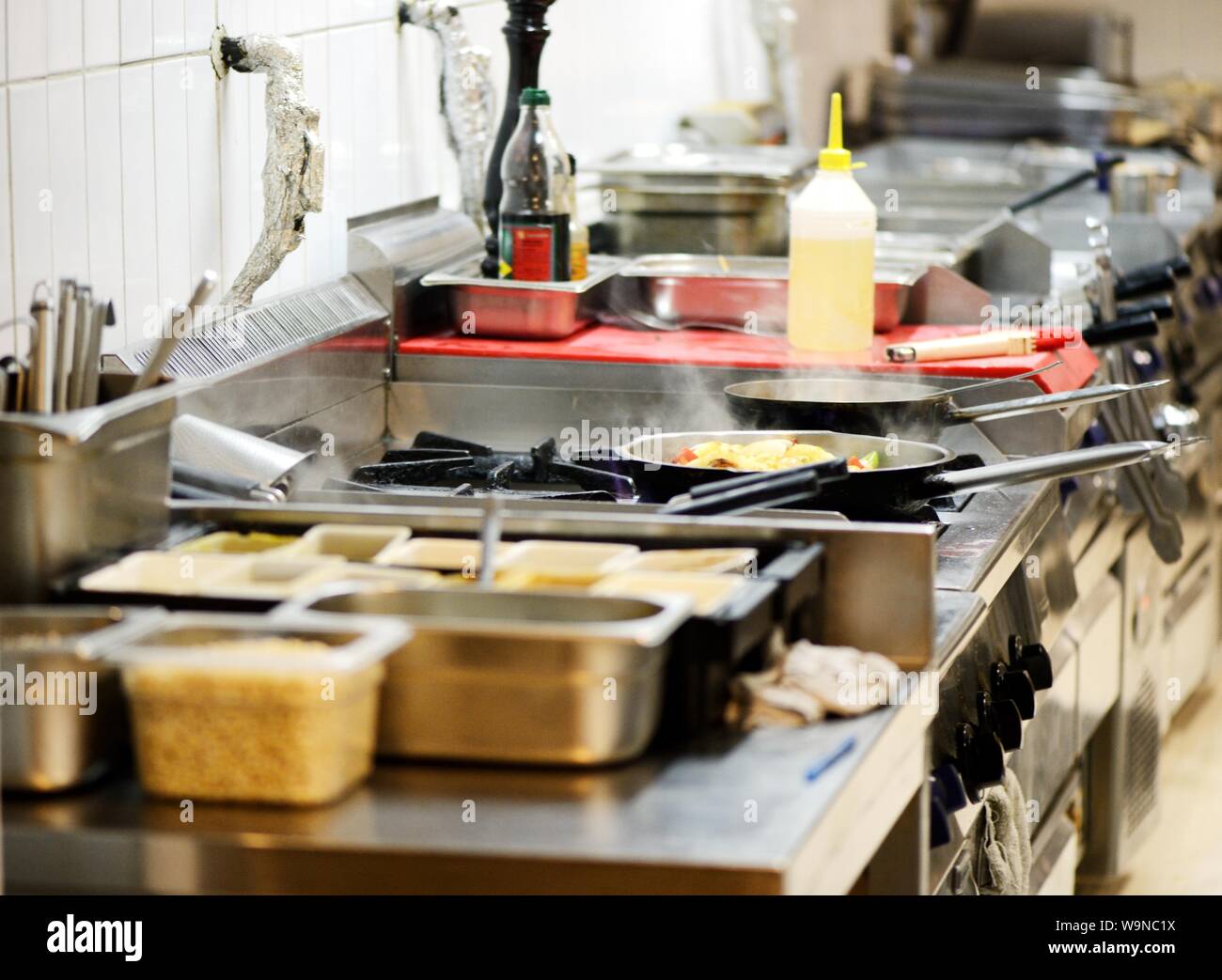 Work surface and kitchen equipment in professional kitchen Stock Photo
