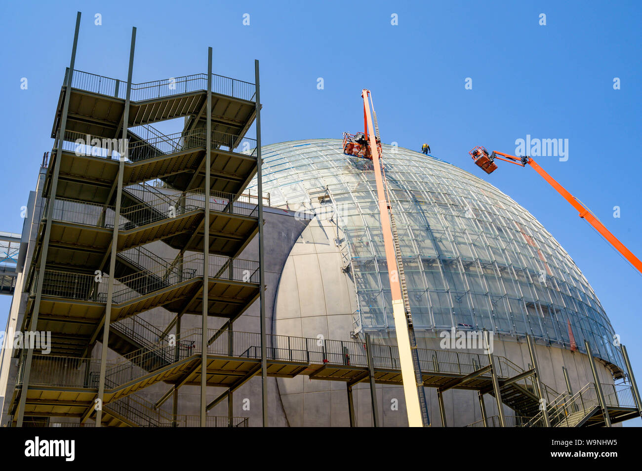Los Angeles, California, USA. 12th Aug, 2019. Construction continues on the long delayed Academy Museum of Motion Pictures. Originally slated to open in 2019, the dater has been pushed back until after the Oscars ceremony in February 2020. Construction challenges with the Death Star-like structure and the renovation of the 1939 May Company building have ballooned the original $250 million dollar cost cost estimate to a projected $388 million. Credit: Stan Sholik/ZUMA Wire/Alamy Live News Stock Photo