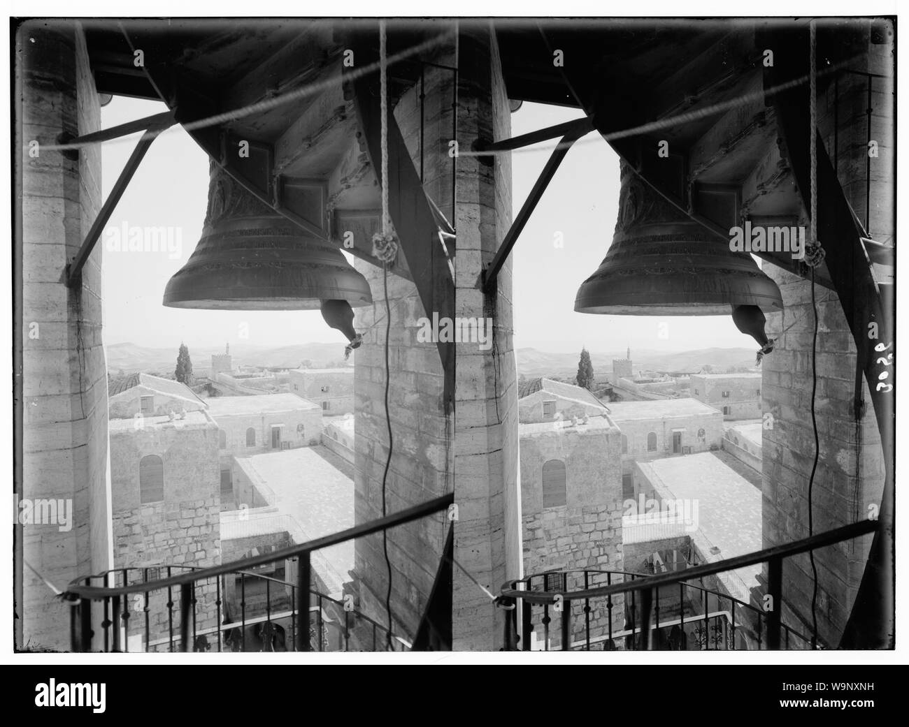 Bethlehem and surroundings. The Christmas bells. Bell of Greek belfry with Bethlehem and desert