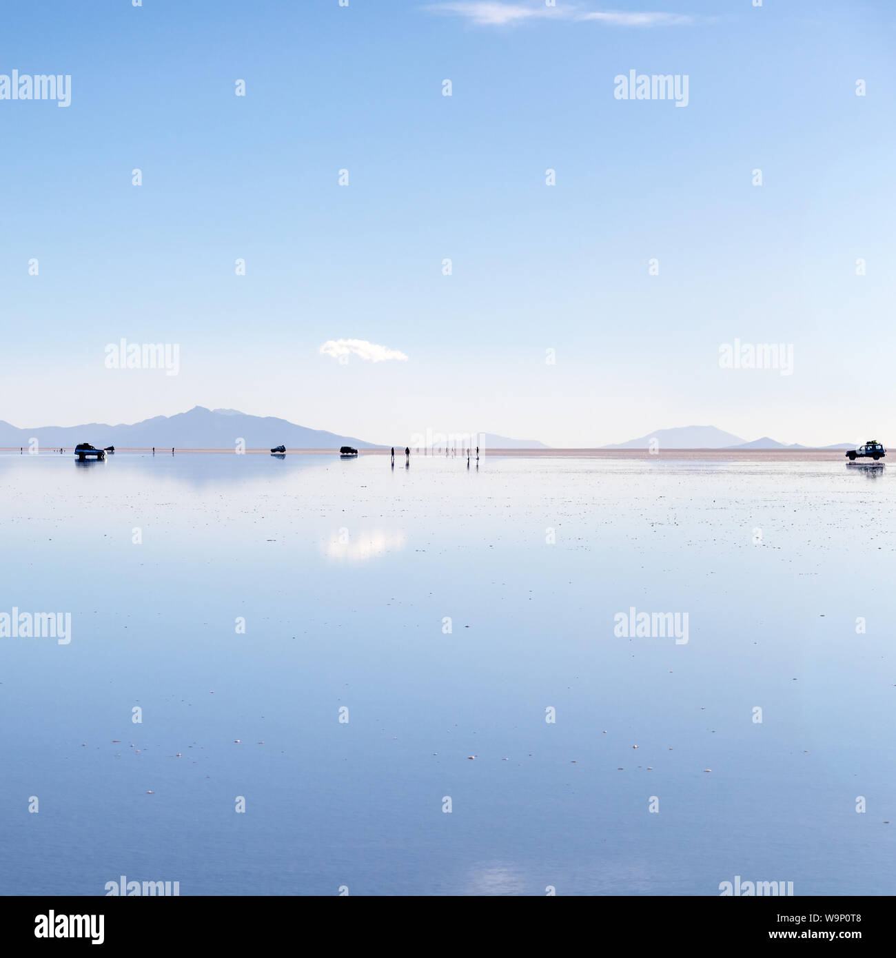 Perfect reflection in Salar de Uyuni, Uyuni Salt Flats in Bolivia, the  incredible mirror-like lake in South America Stock Photo - Alamy