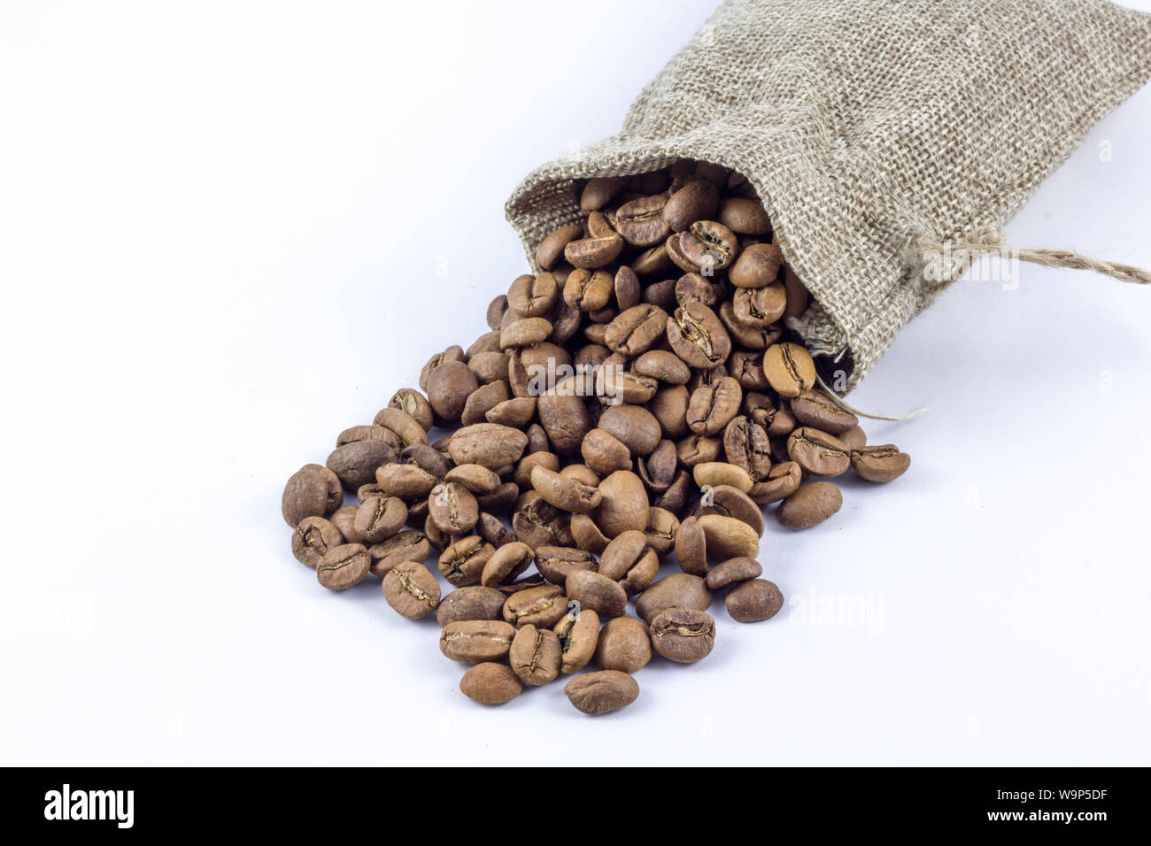 coffee beans in bag isolated on white background Stock Photo - Alamy