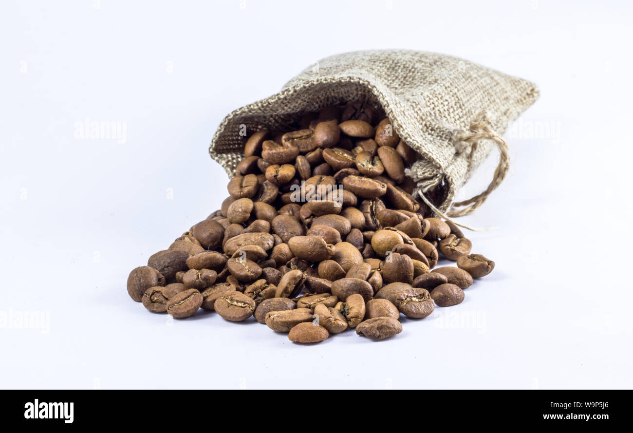 coffee beans in bag isolated on white background Stock Photo - Alamy