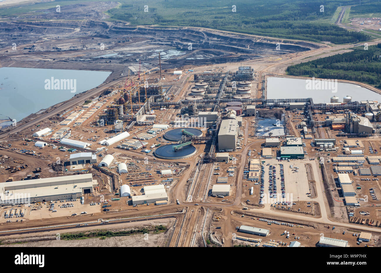 Aerial photo of operations at CNRL Muskeg River Mine oil sands facility. Stock Photo