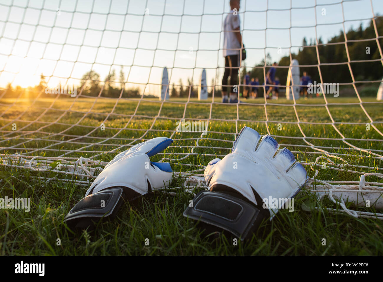 football game equipment gloves, on grass Stock Photo Alamy