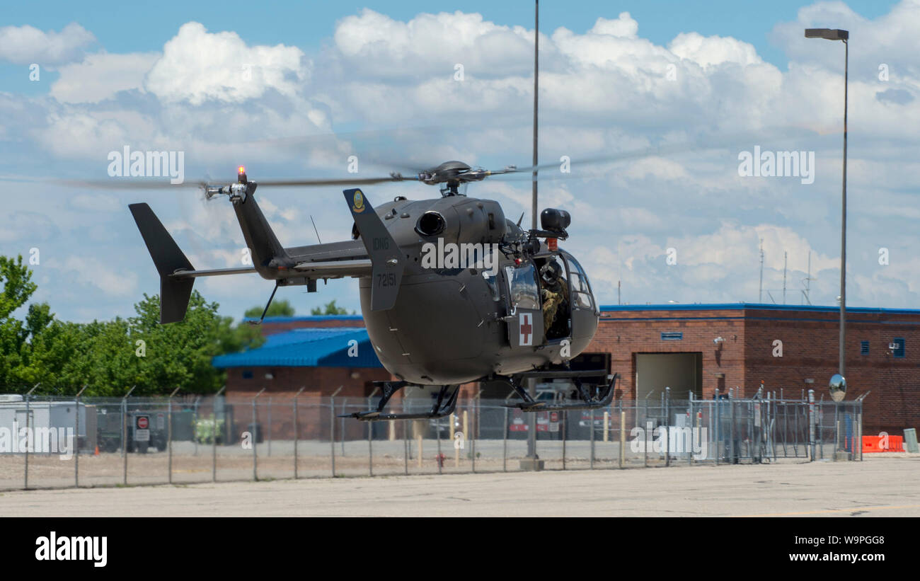 Members of DET 1 D co. 1-112th taxi a Eurocopter UH-72 Lakota helicopter for a statewide training exercise, May 31, 2019, Gowen Field, Boise, Idaho. The exercise includes rescue training classes and workshops with local agencies training for recovery operations. (U.S. Air National Guard photo by Ryan White) Stock Photo