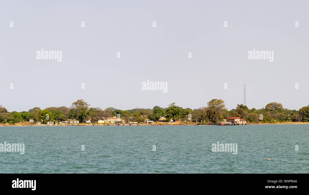African village seen from the river. From this village. This is the birthplace from Kunta Kinte Stock Photo